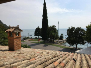 Отель Merlo Nero Apartments  Гарда